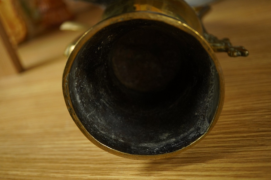 A Chinese cylindrical blue and white brush pot and a brass ewer, largest 39cm high. Condition - fair